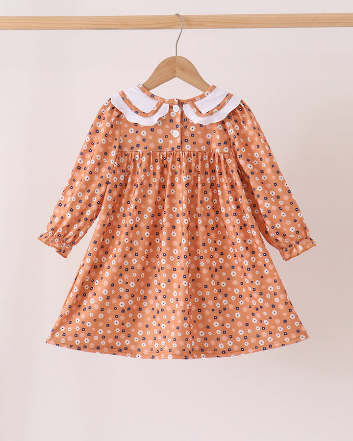 Rust floral long-sleeve dress with Peter Pan collar and white tie front