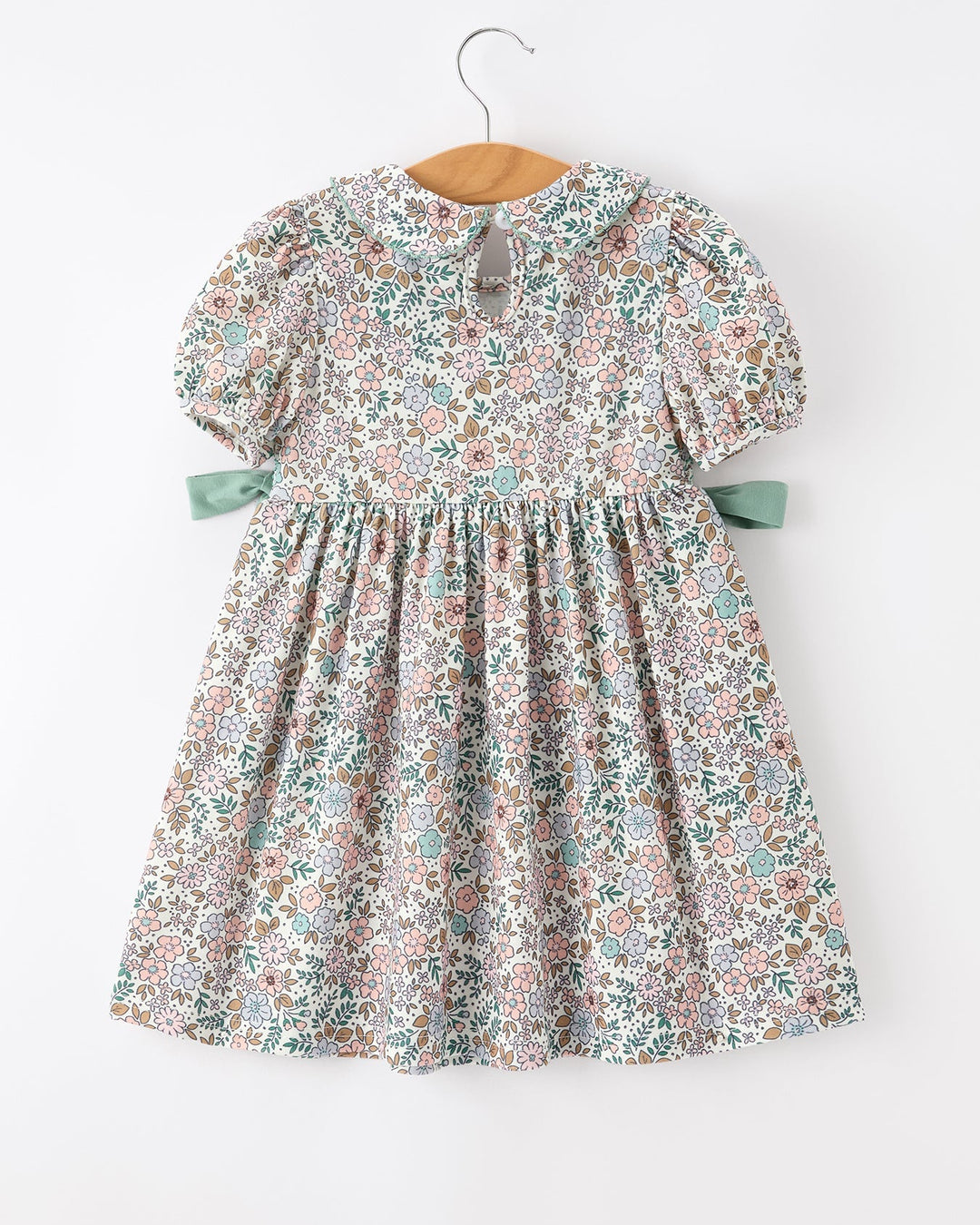 Girls floral smocked dress, short puff sleeves with sage ribbon ties