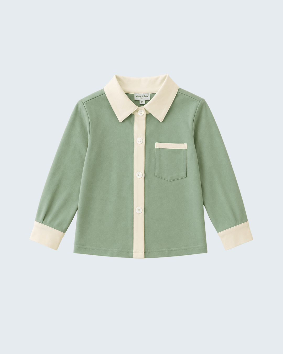 Sage green button-down shirt with cream collar, front buttons, and chest pocket