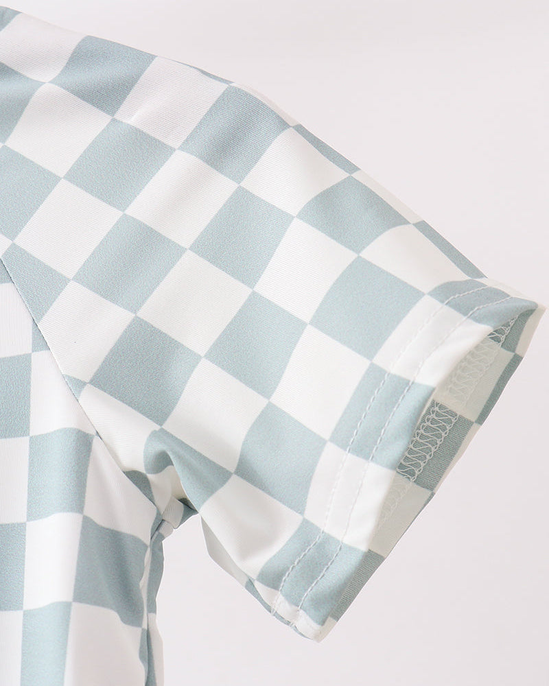 Checkered fabric with light blue and white pattern on a white background