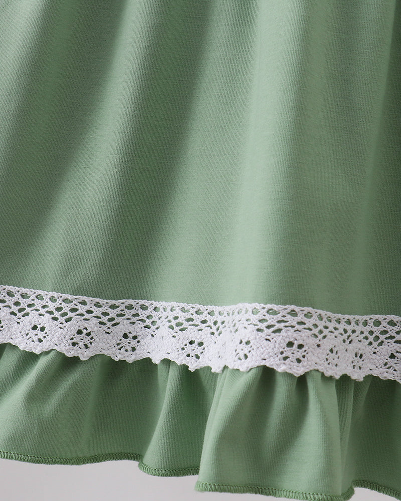 Sage green lace-trim ruffle hem dress detail with gathered skirt