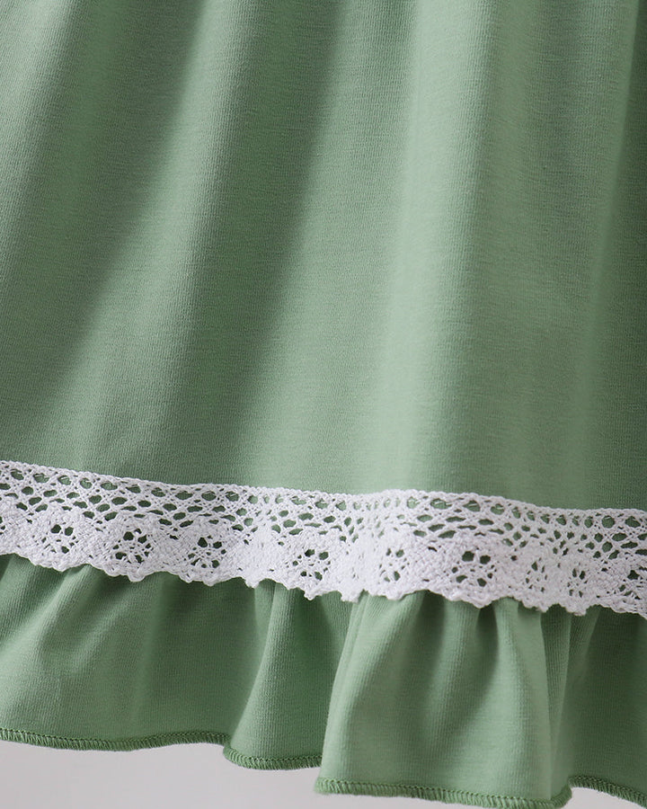 Sage green lace-trim ruffle hem dress detail with gathered skirt