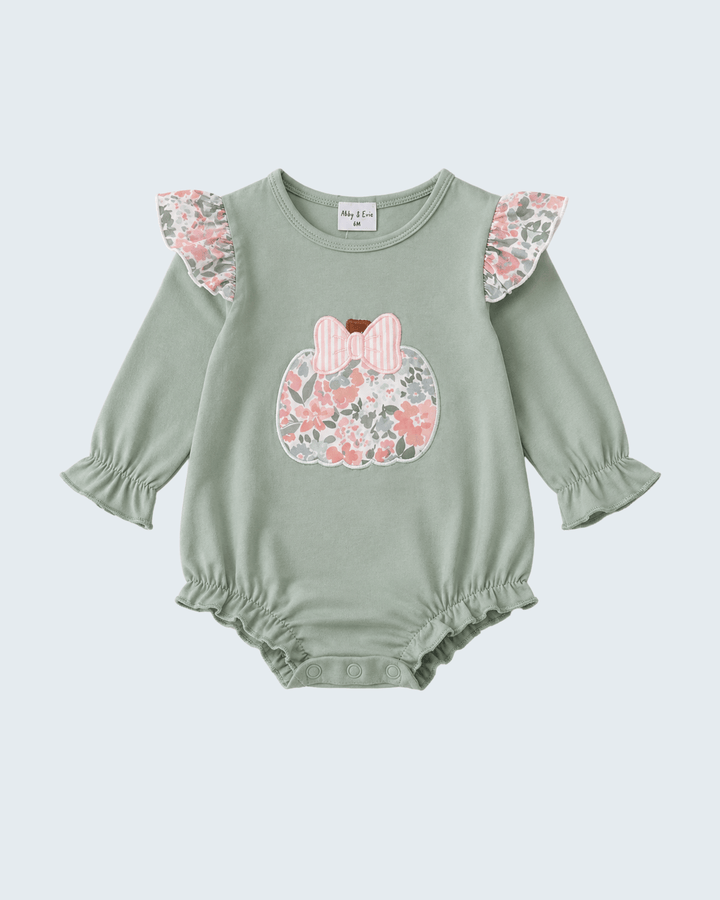 A baby long-sleeve romper in sage green, featuring ruffled floral-patterned sleeves and a matching floral applique chest design with a pink bow, shown on a light gray background.