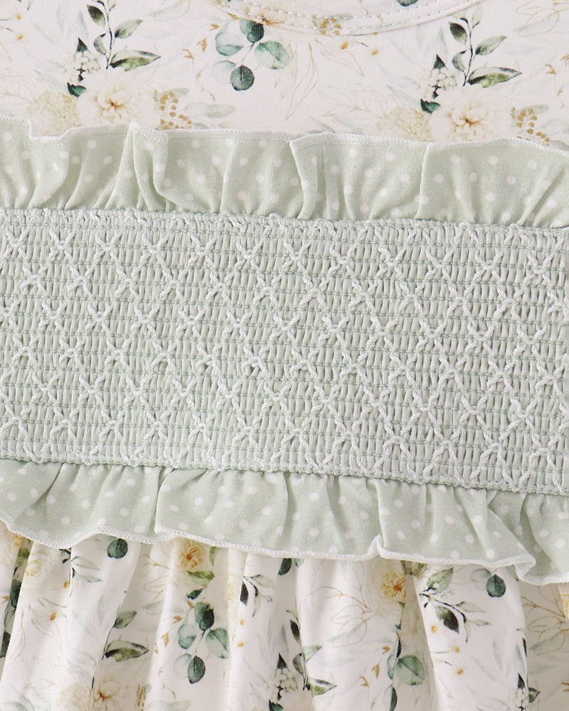 Sage green smocked ruffle waist pants with tiny white dots and layered hem
