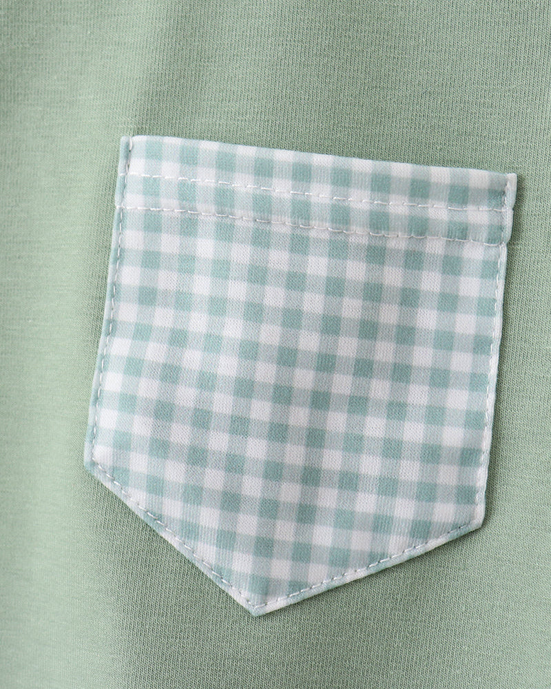 Green shirt with a checkered pocket