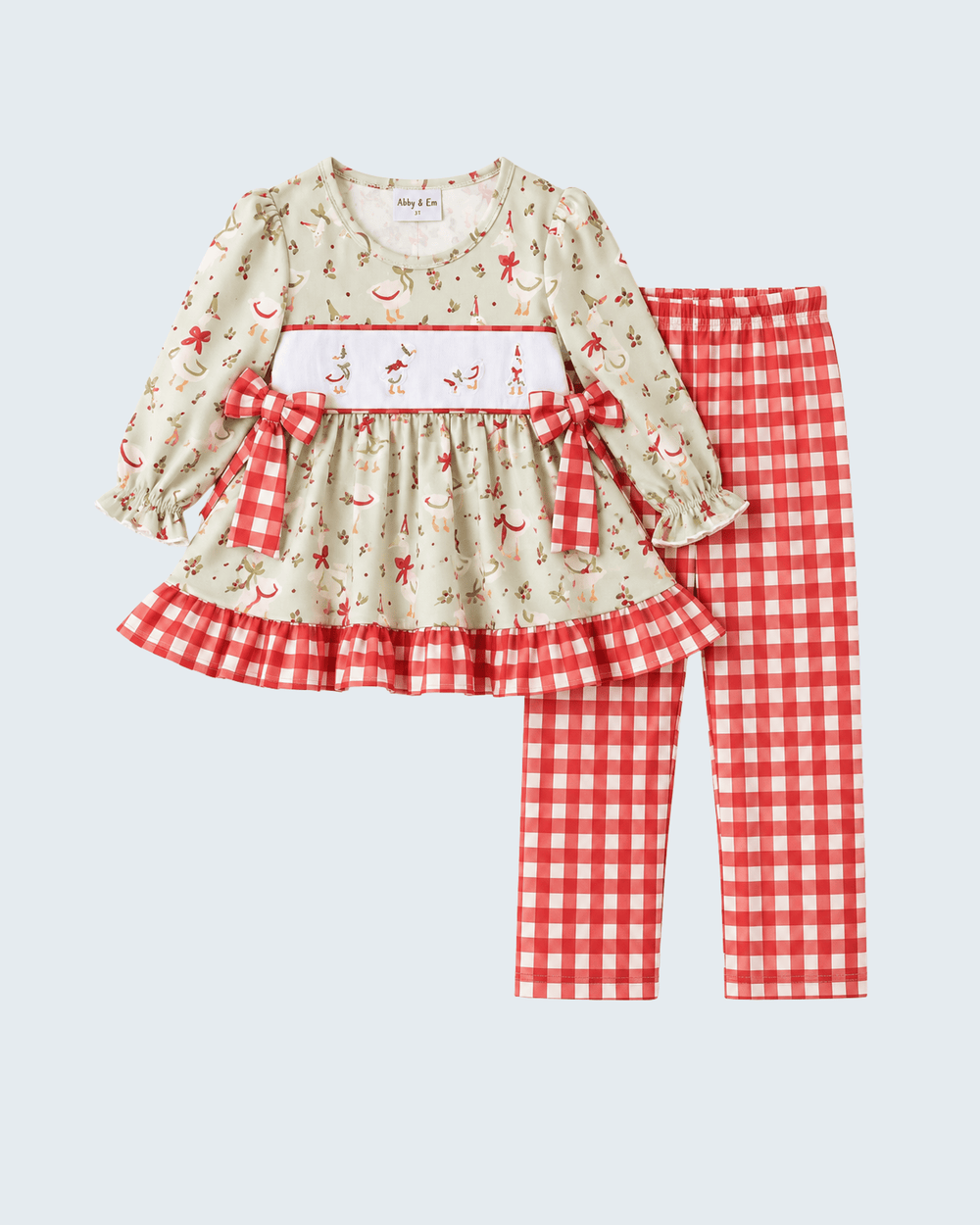 Kids printed ruffle top with red bow and matching red gingham pants