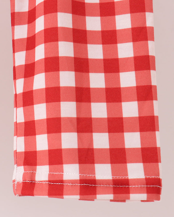Kids red-and-white gingham pants with elastic waist and stitched hem