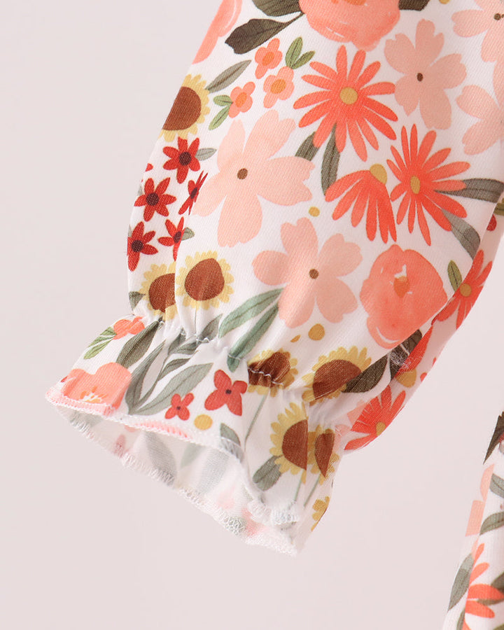 Floral bubble dress with patterned long sleeve and ruffled hem
