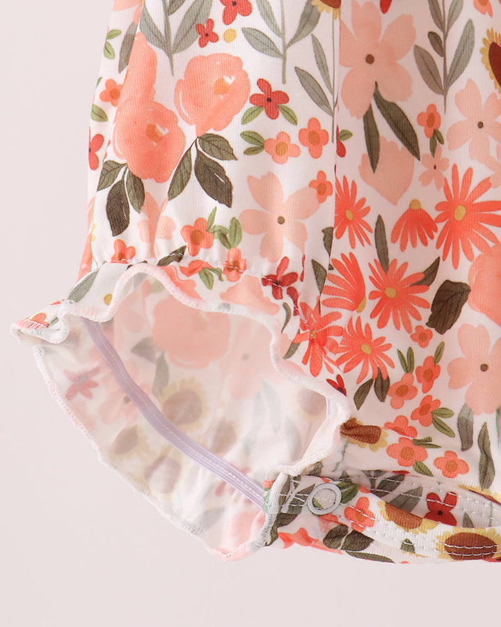 Floral bubble dress with ruffle-trimmed back and layered under-hem