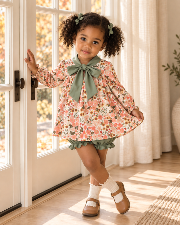Floral long-sleeve dress with large sage bow and sage ruffle hem, paired with bloomers