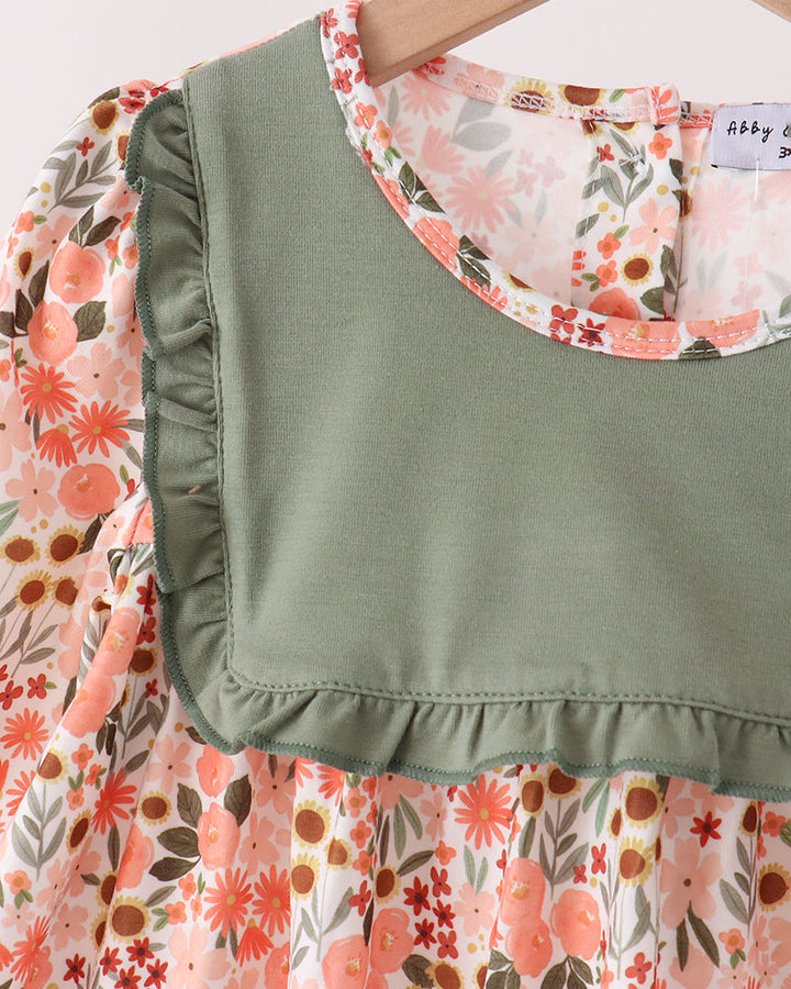 Green bodice with ruffled neckline and floral long sleeve top
