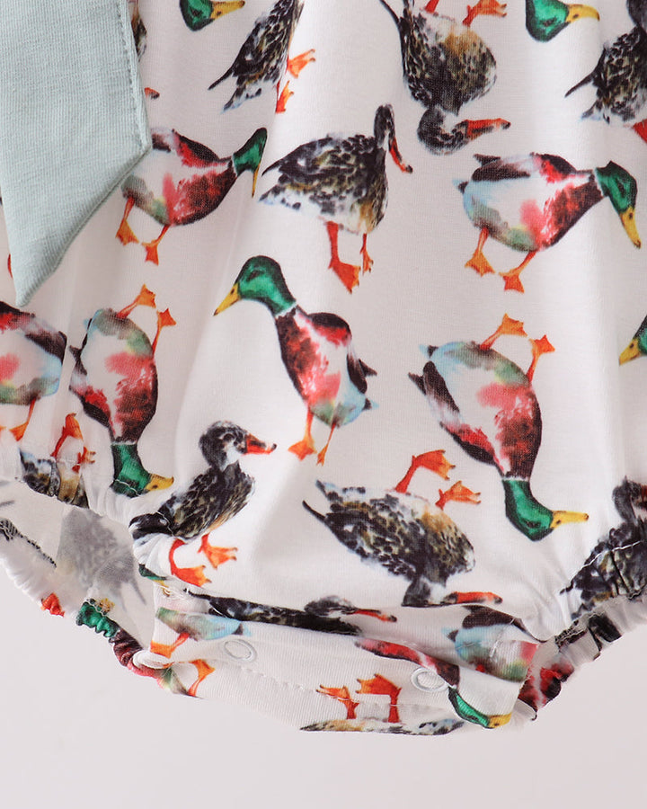 Infant romper gathered hem with multicolor bird print and ruffle edging