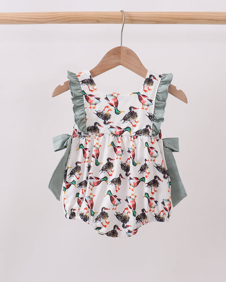 Infant ruffle bubble romper on hanger with bird print and sage green side ties