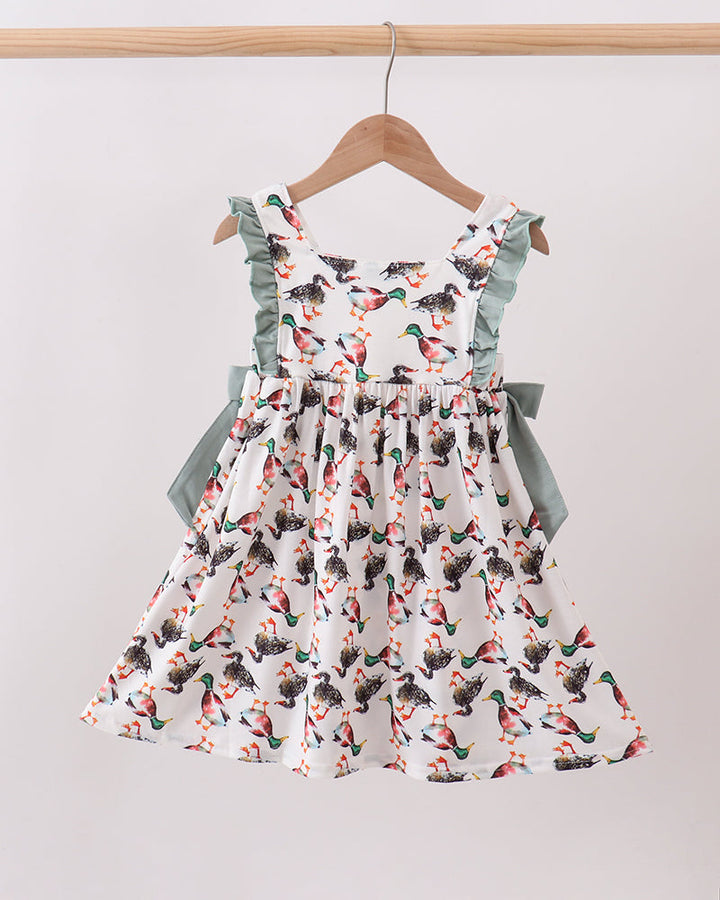 Bird-print ruffle dress with sage-green sleeves and full gathered skirt