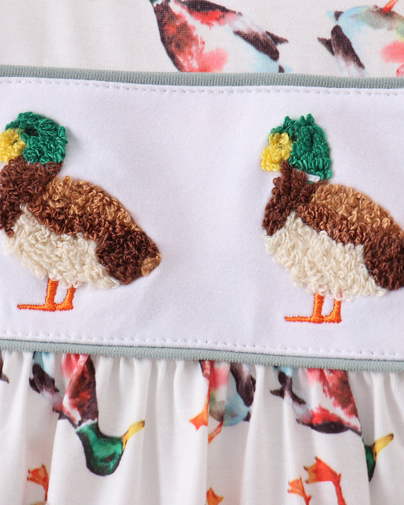 Bird-print shorts with sage elastic waistband and embroidered duck patches