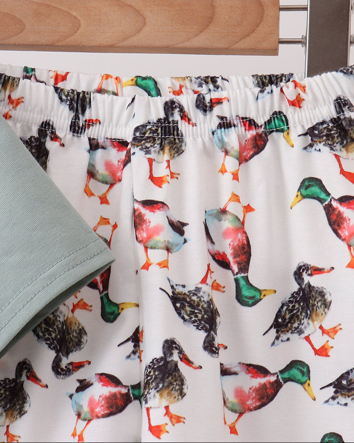 Duck-print shorts with elastic waistband and sage T-shirt hem
