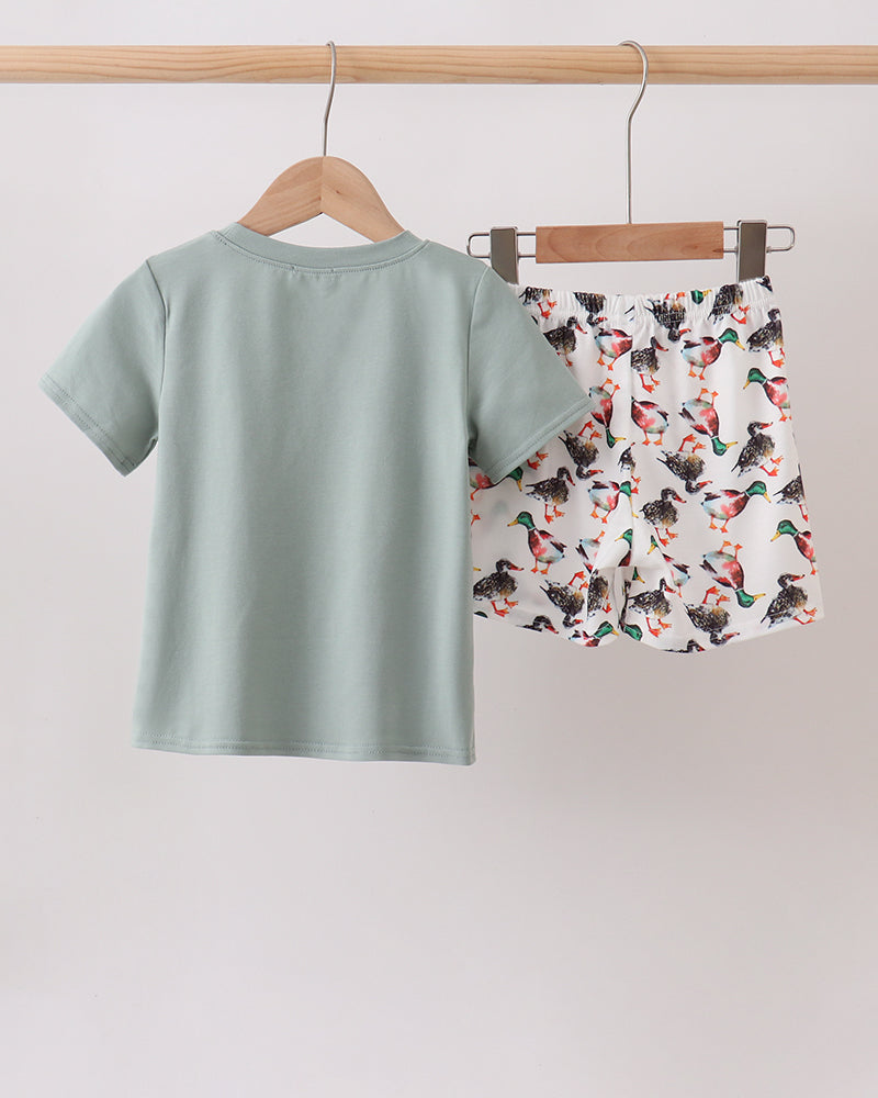 Sage green kids T-shirt and duck-print shorts set, back view
