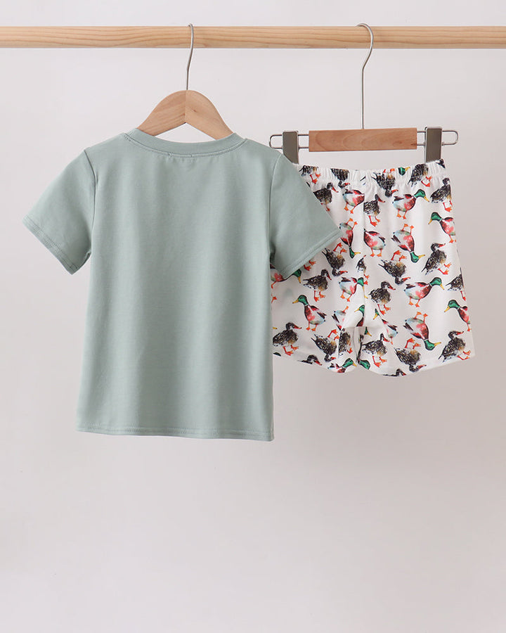Sage green kids T-shirt and duck-print shorts set, back view