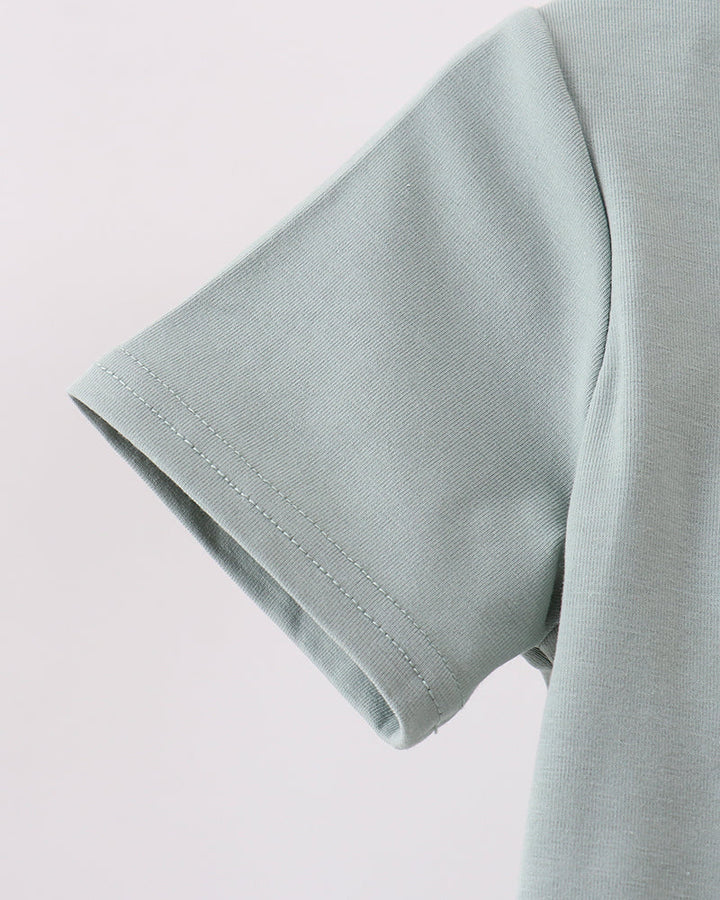 Sage green short-sleeve top with stitched sleeve hem