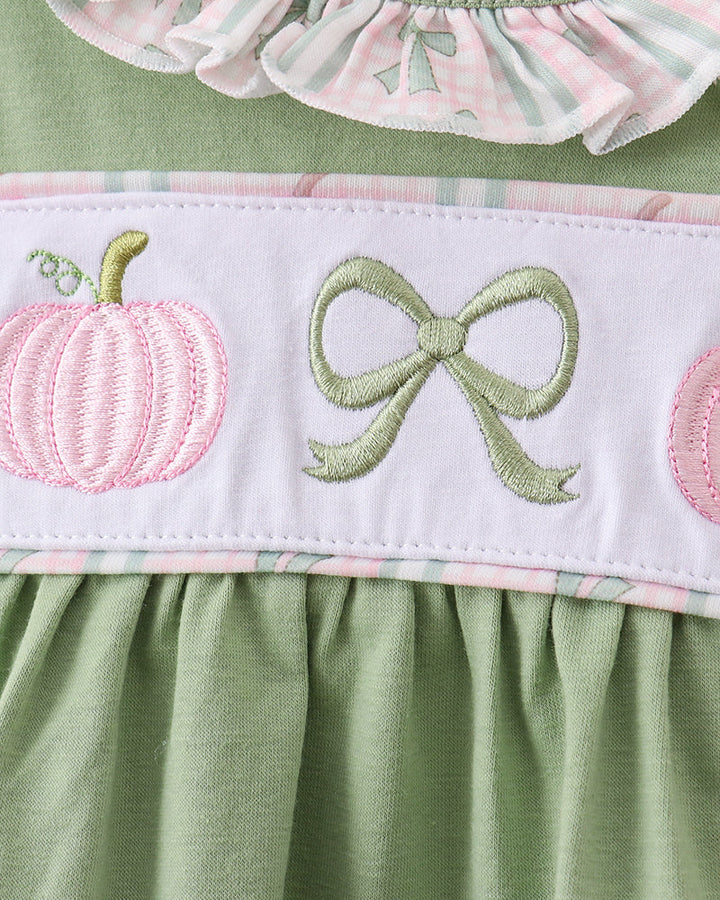 Embroidered baby bloomer with green bow and pumpkin appliques, elastic waistband