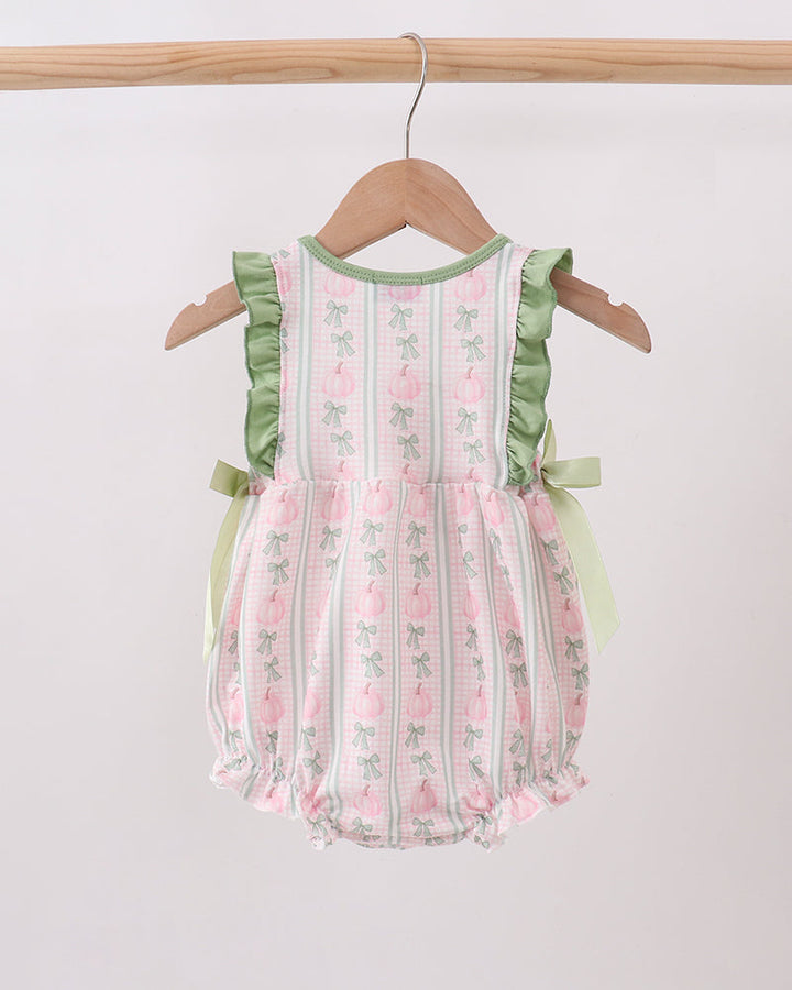 Pink plaid baby dress with green ruffle shoulders, embroidered pumpkins, and gathered bubble hem