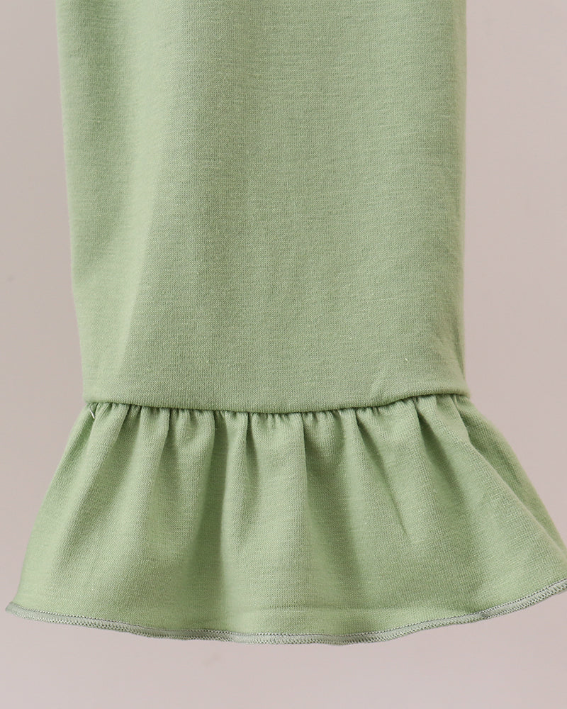 Sage green leggings with gathered ruffle hem