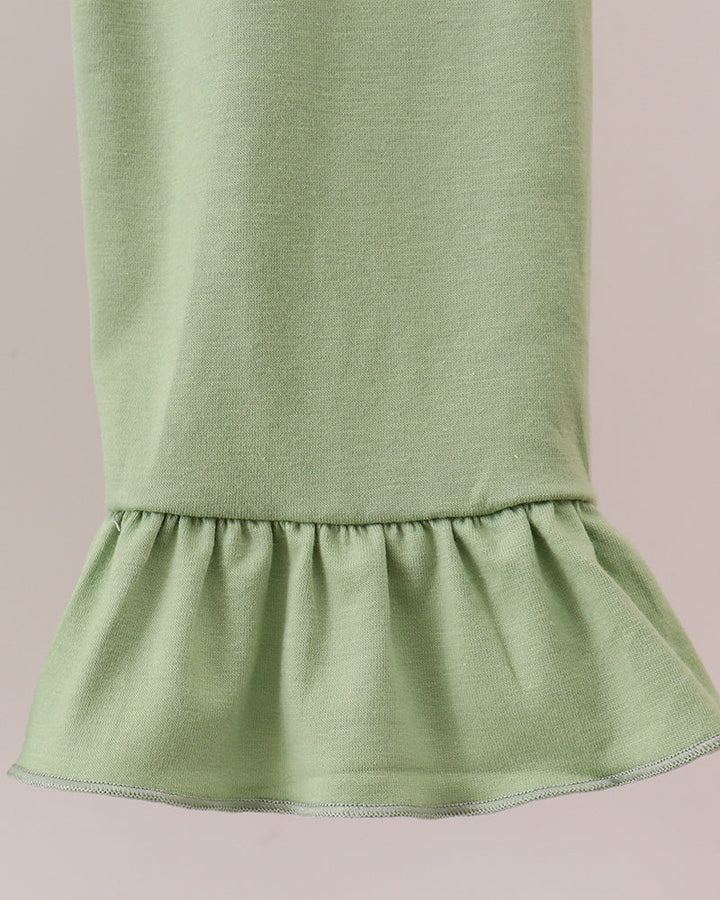 Sage green leggings with gathered ruffle hem