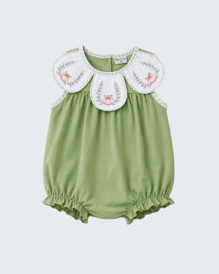 A baby romper in sage green with a white Peter Pan collar featuring embroidered floral details, shown against a light gray background.