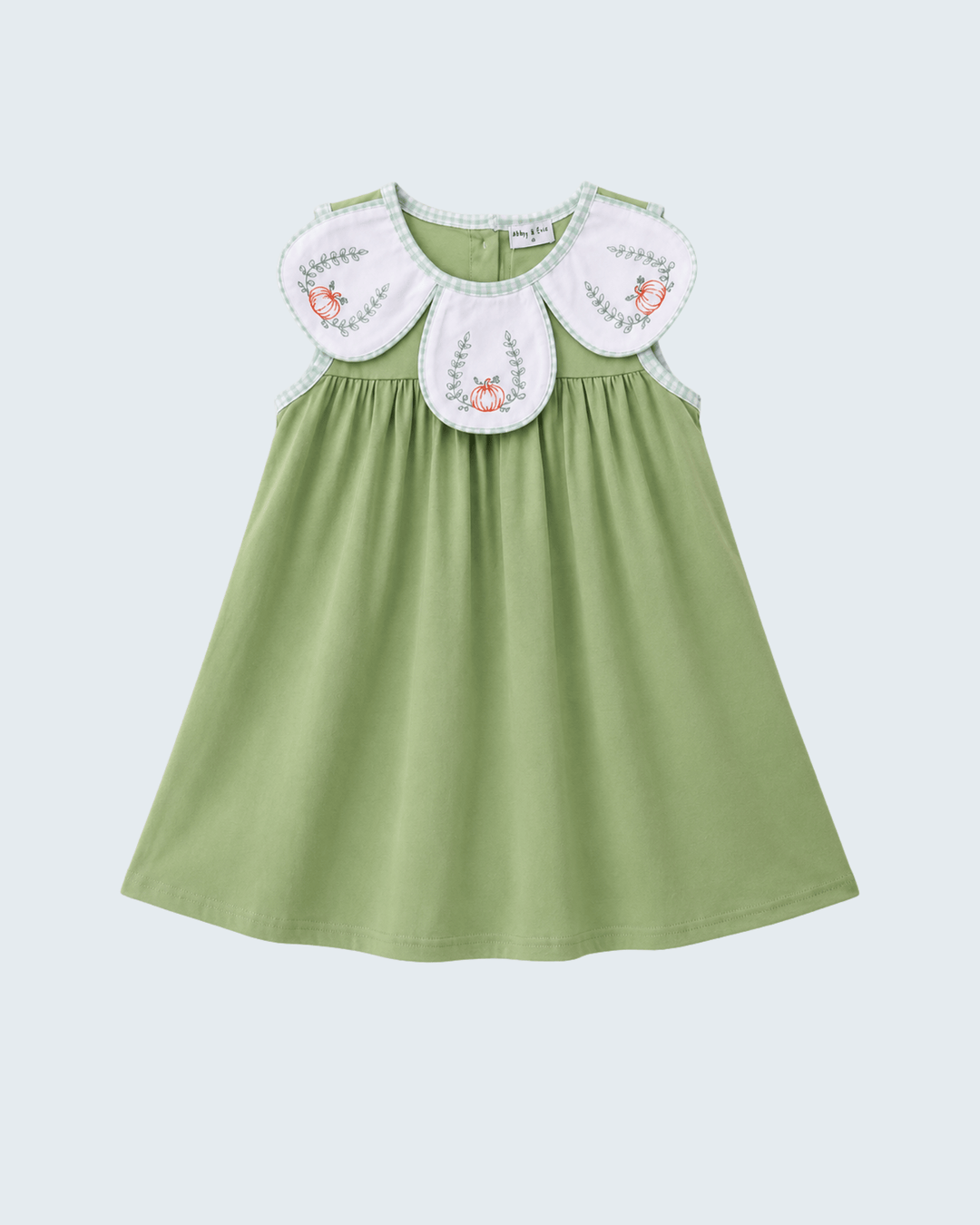 A light green sleeveless baby dress with a large white Peter Pan collar featuring embroidered floral details, shown against a light gray background.