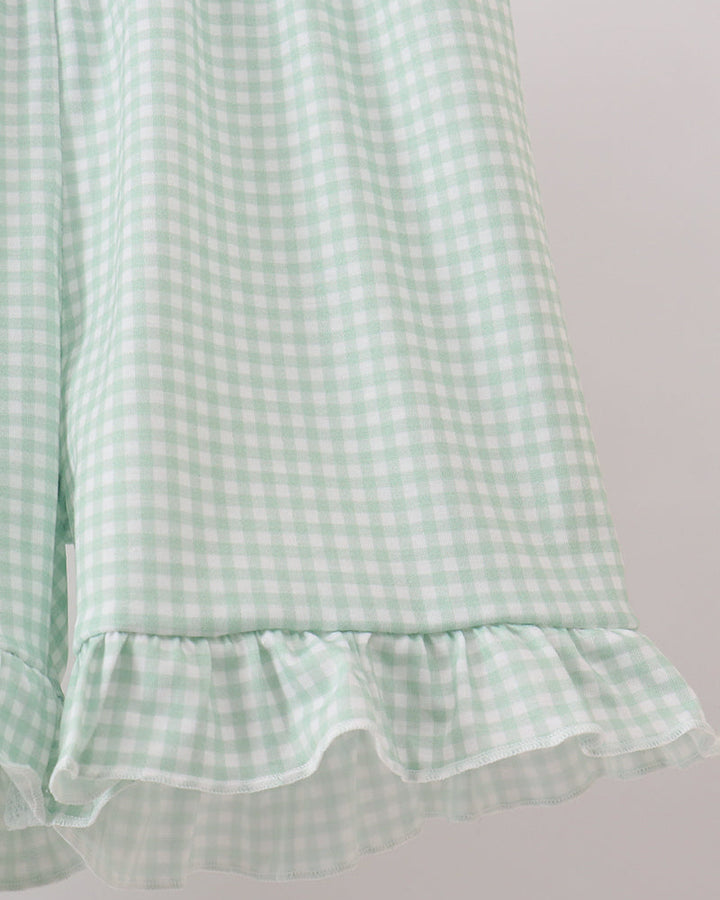 Light sage gingham shorts with ruffled hem
