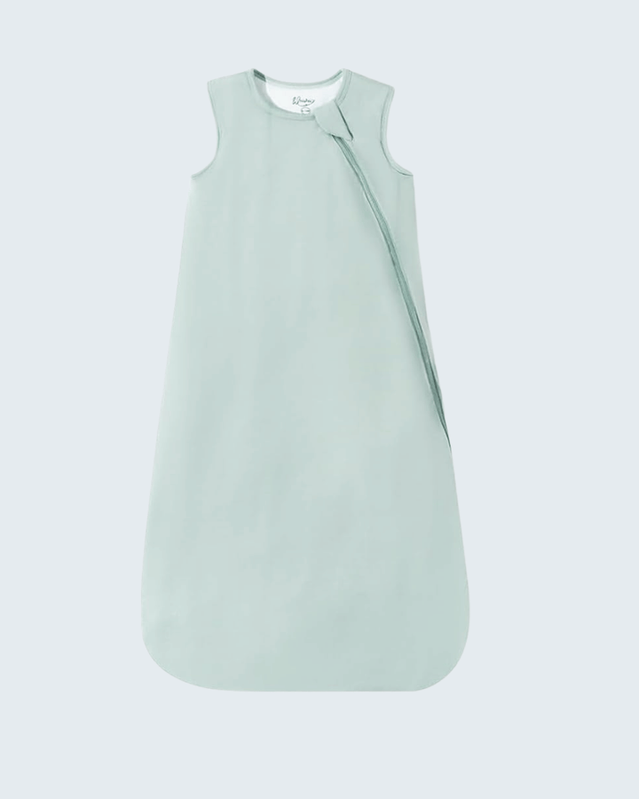 A pale mint green baby sleep sack with a side zipper, displayed flat against a light gray background.