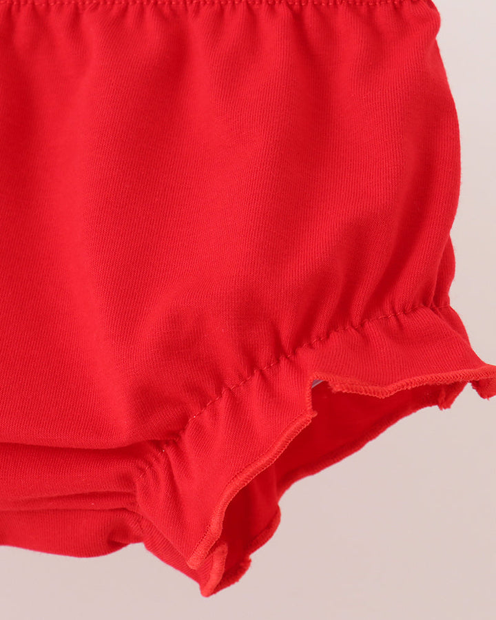 Red knit bloomer shorts with elastic waist and scalloped hem