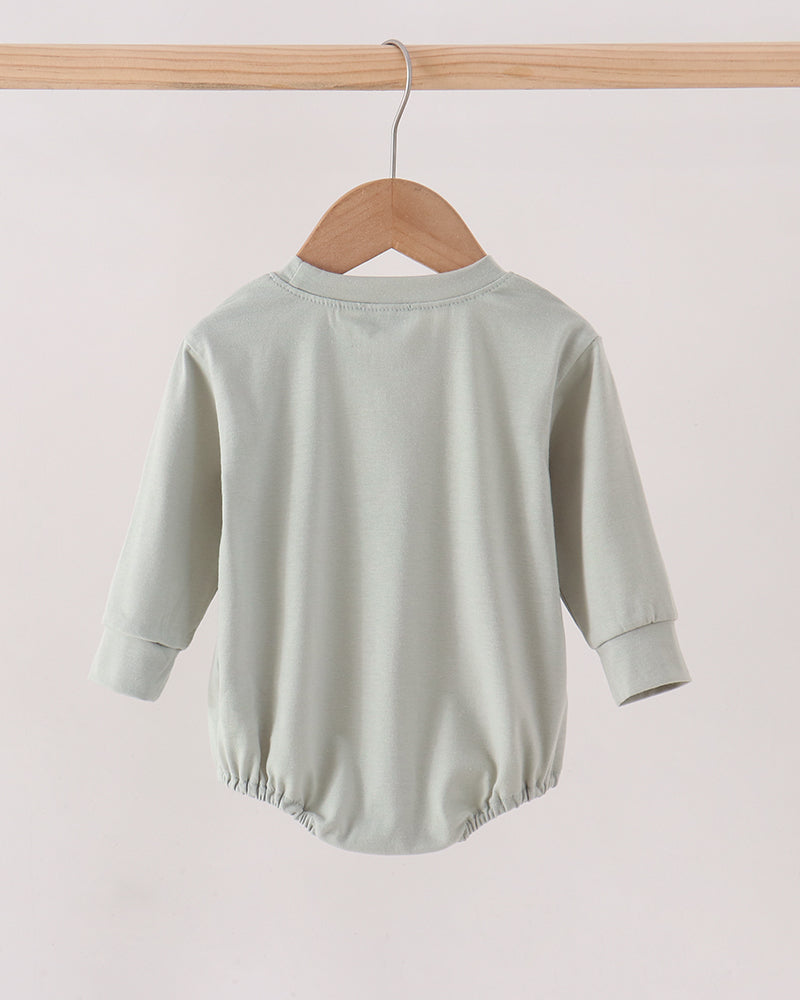 Sage green long-sleeve bubble romper back with elastic waist