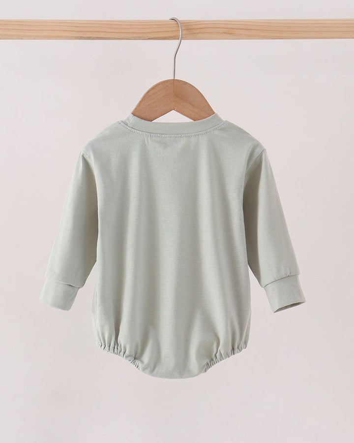 Sage green long-sleeve bubble romper back with elastic waist
