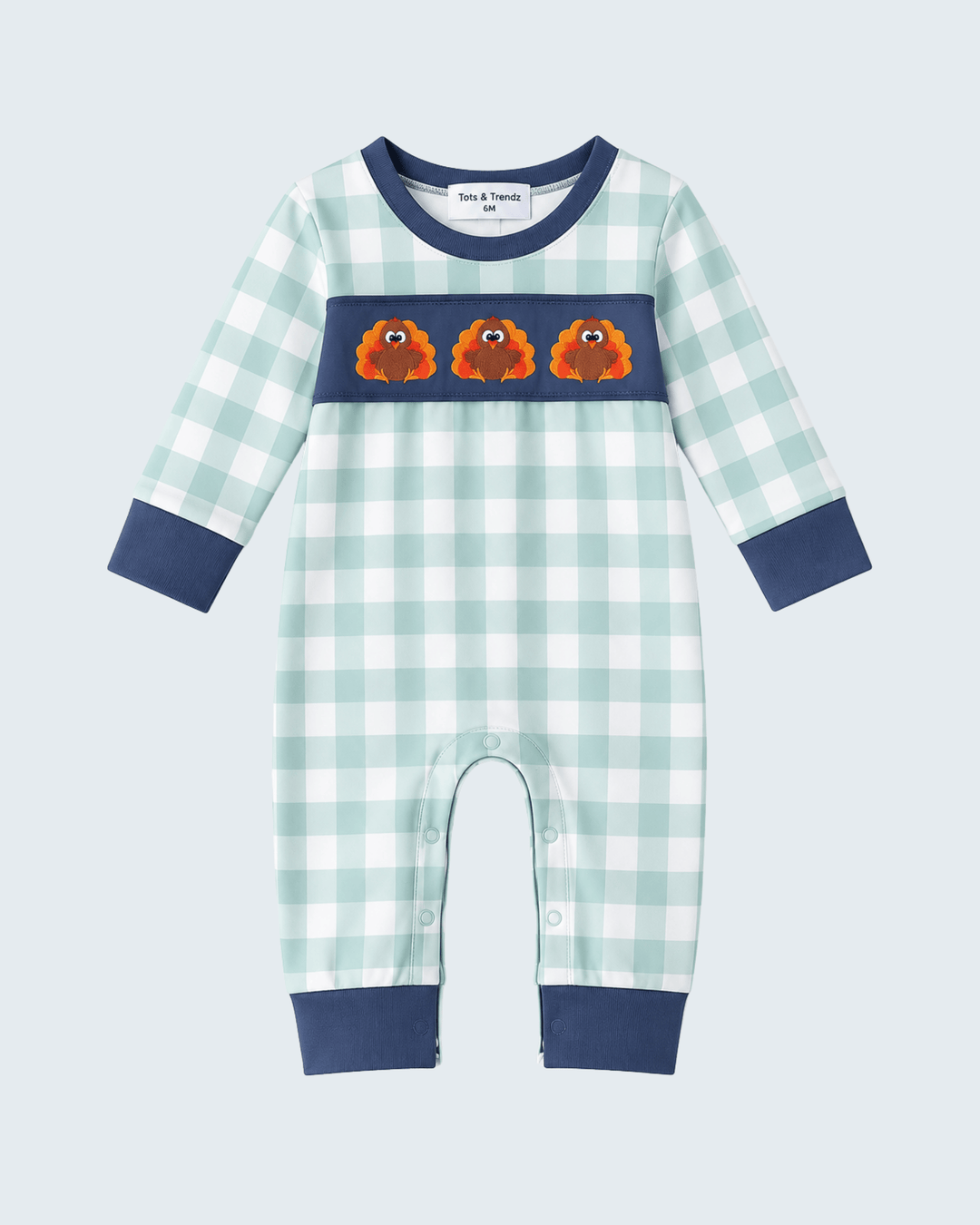 Mint gingham baby romper with navy yoke, embroidered turkeys, and snap front legs