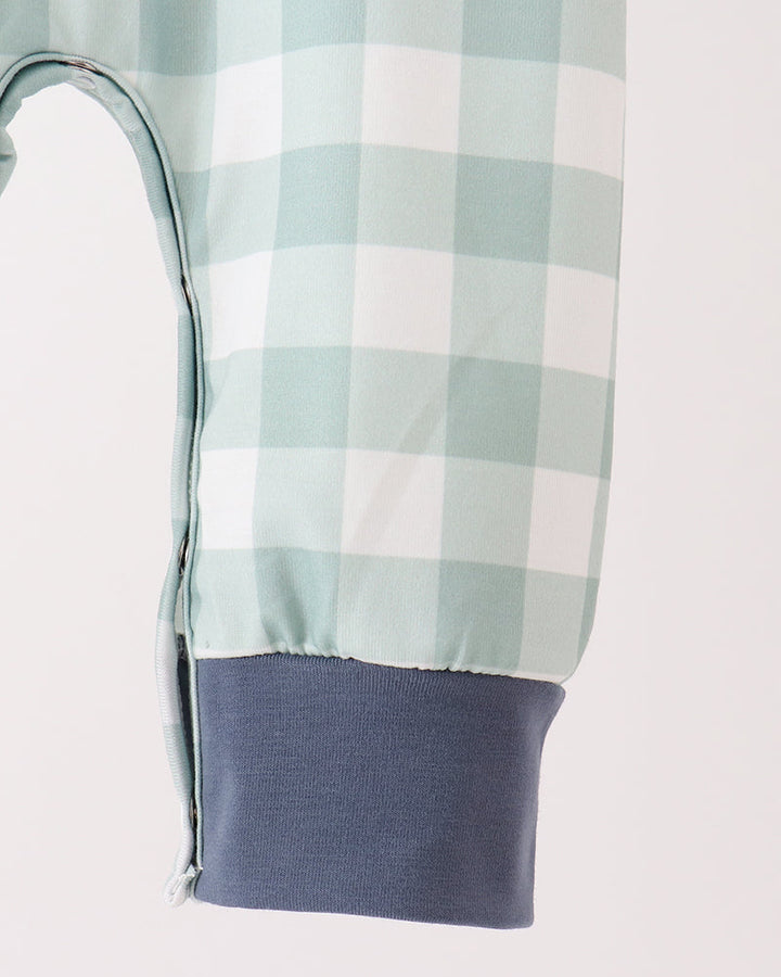 Mint gingham baby romper leg opening with navy knit cuff