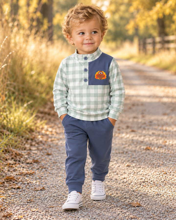 Sage Turkey Embroidered Gingham Jogger Set boy is wearing a 