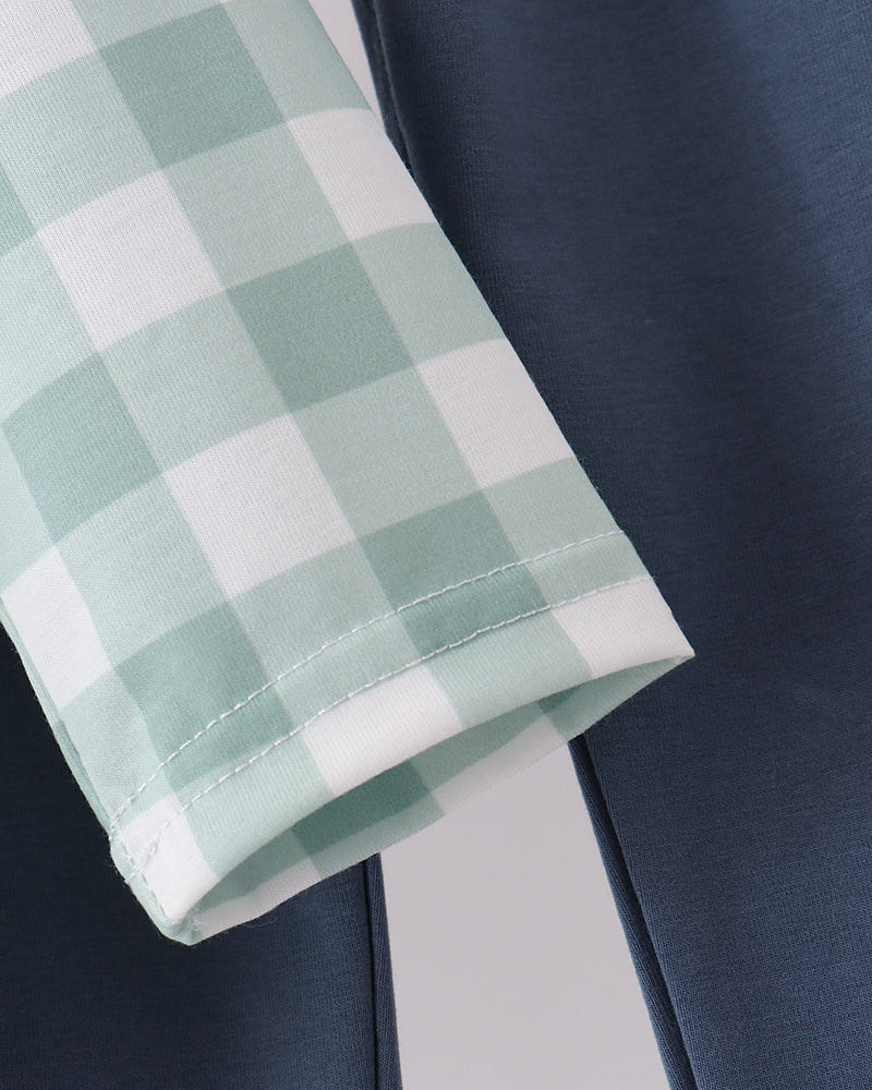 Gingham cuff with stitched hem and dark blue elastic-waist pant legs