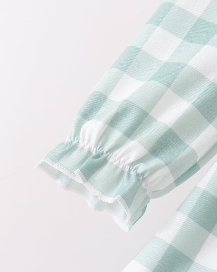 Sage green gingham long sleeve with elastic cuff and white ruffle hem