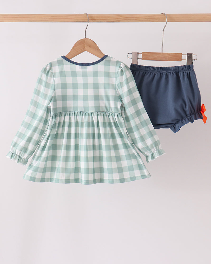 Sage green gingham ruffle top set with navy bloomers and orange bow accents
