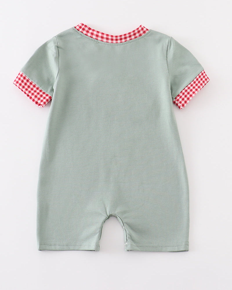 A baby short-sleeve romper shown from the back, featuring a sage green body with red and white gingham check trim on the collar and sleeve cuffs, set against a plain light gray background.