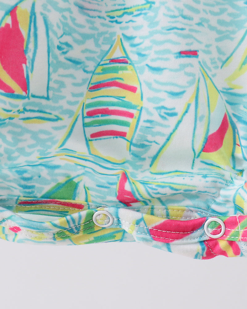 Colorful sailboat patterned fabric on a white background