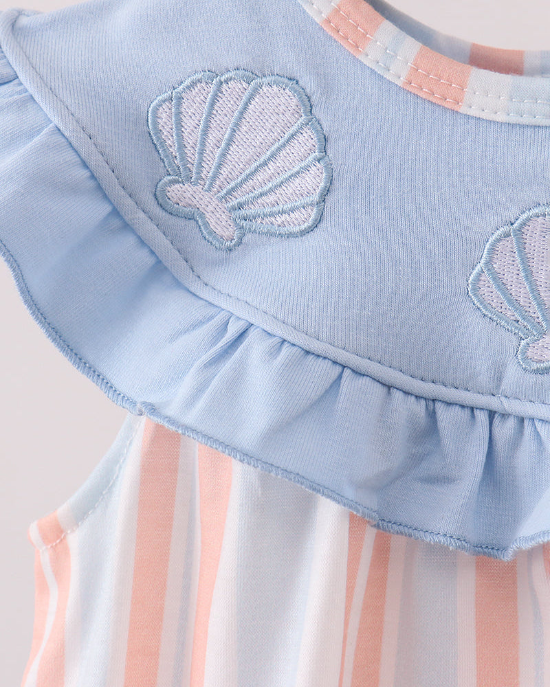 Light blue bubble romper detail: seashell embroidery and layered ruffled collar