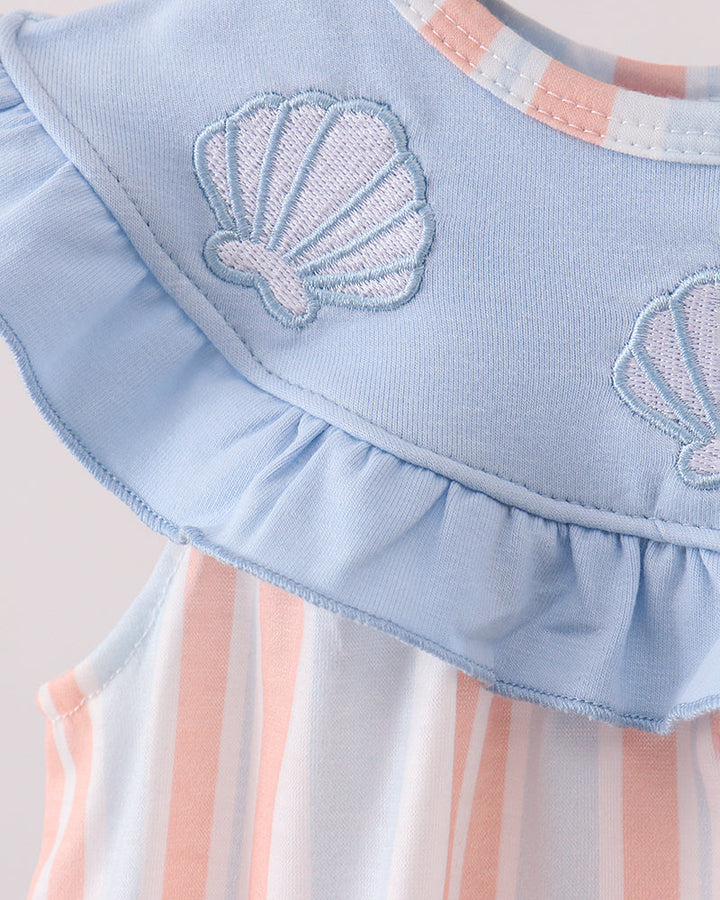 Light blue bubble romper detail: seashell embroidery and layered ruffled collar