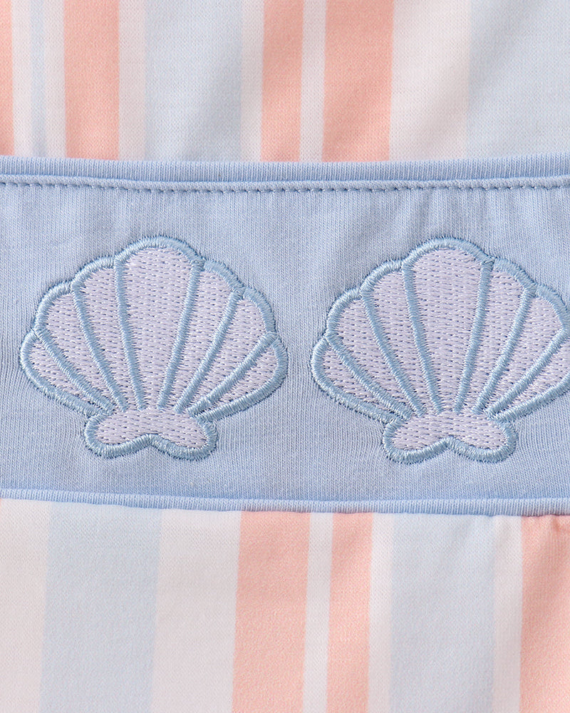 Blue chambray band with two stitched seashells on a striped jon jon