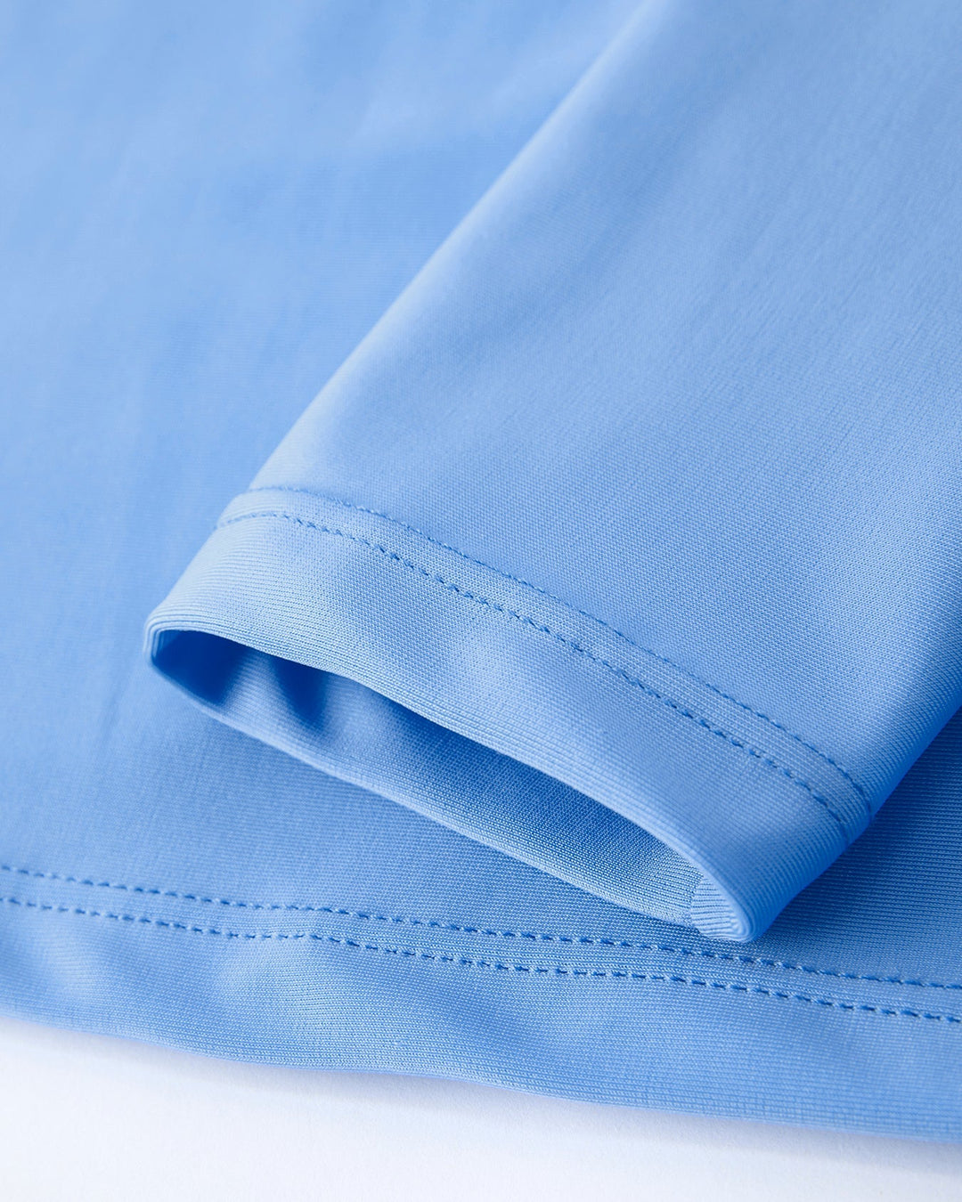 Close-up of a blue fabric with a white background