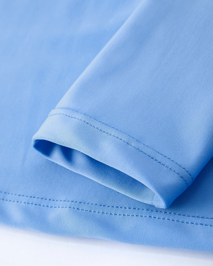 Close-up of a blue fabric with a white background