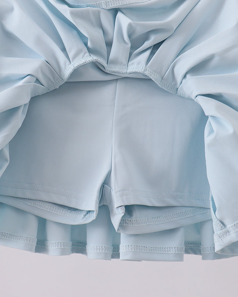 Light blue skorts on a white background