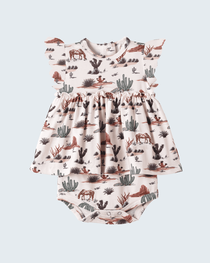 Baby romper with desert animal print on a light gray background