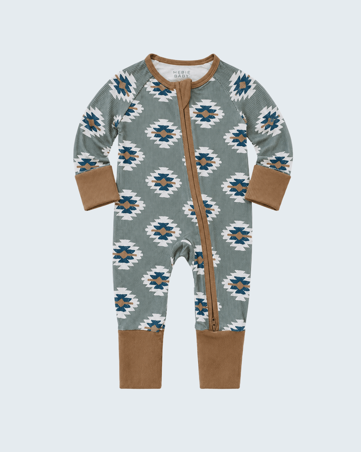 Aztec-pattern ribbed bamboo zipper romper with long sleeves, brown cuffs and legs.